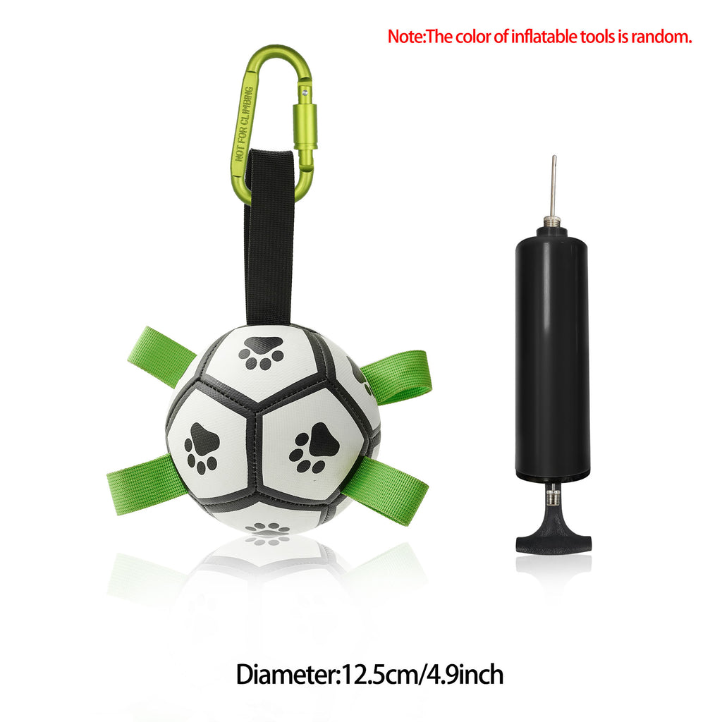 Inflatable dog toy shaped like a soccer ball with green straps and a pump 