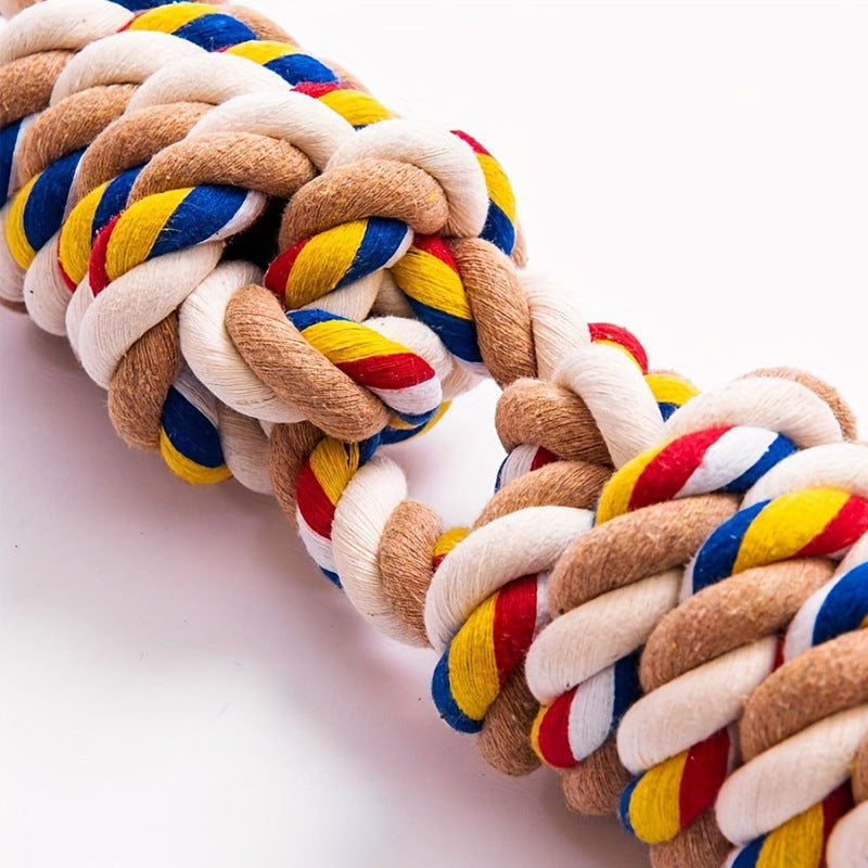 Colorful braided rope toy on a white background