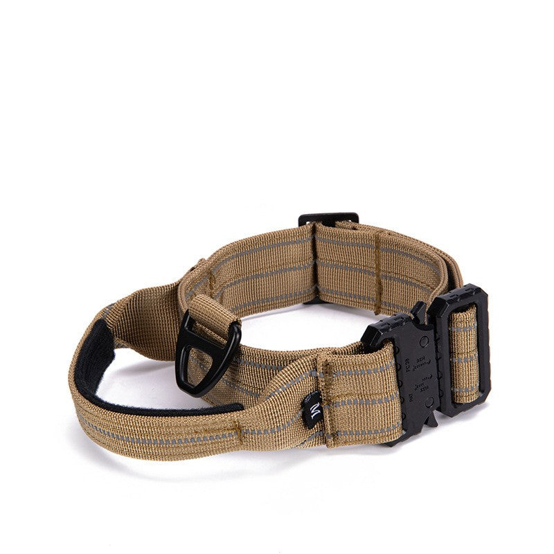 Brown dog collar with black hardware on a white background
