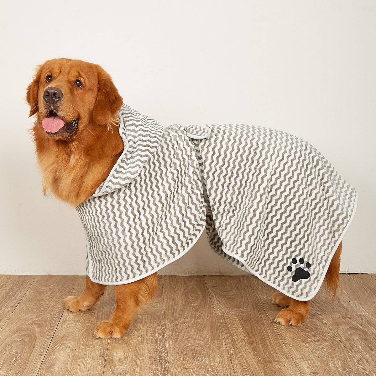 Dog wearing a patterned microfibre towel bathrobe